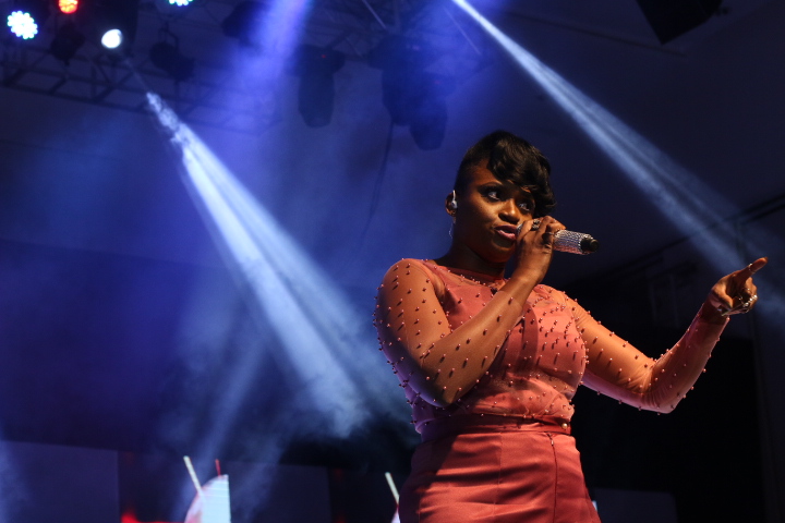 Waje performing live on stage